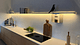 Wandplank Raw Aluminium met verlichting onder en rondom zacht licht klant Amsterdam Ijburg 1920 x 1080 pxl