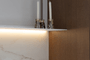 White wall shelf with lighting strackk northern architects kitgcne close up 1920x1080pxl