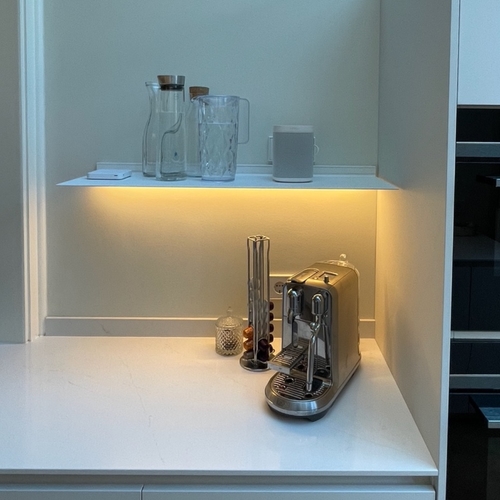 Wall shelf with lighting underneath From Strackk above coffee maker Styling by Mies Interieur 1080 x 1080 pxl