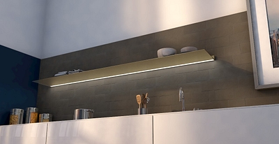 Wandplank met verlichting onder Plank in goud boven keukenaanrecht Van Strackk Onderaanzicht 1280x660 pxl