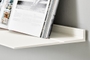 White wall shelf from Strackk with book in ledge 1196 x 1196 pxl