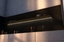 Wall shelf with lighting underneath. Perfect light for above kitchen counter top. Wall shelf in anodic Gold. From Strackk. Bottom view